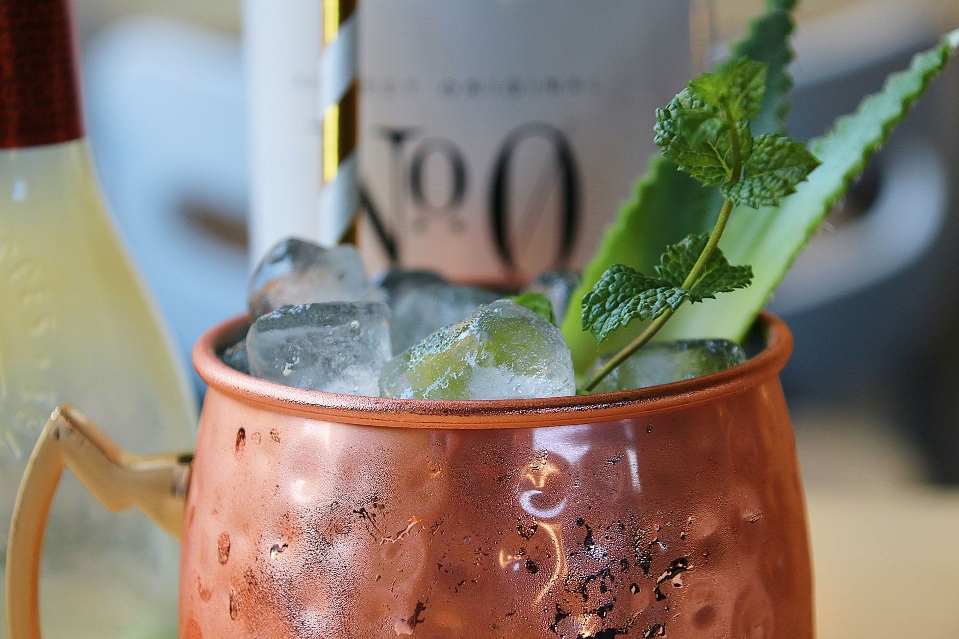 A cold drink in a copper mug