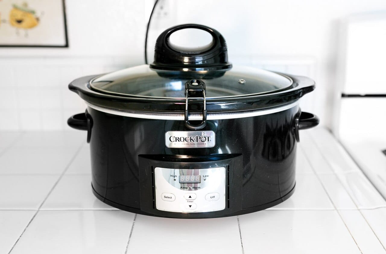 A slow cooker on a kitchen counter