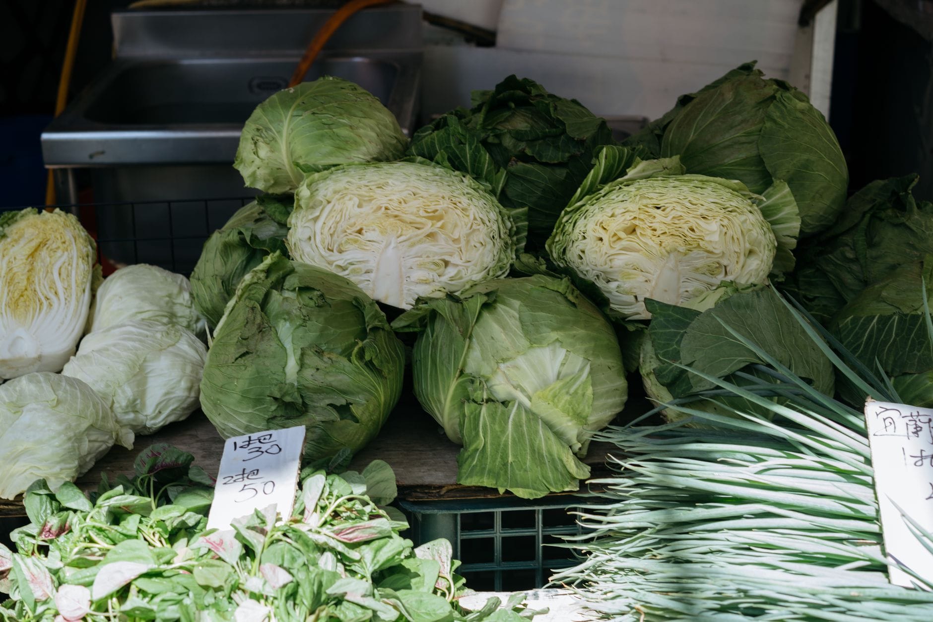 Cabbages for sale at a farm gate stall