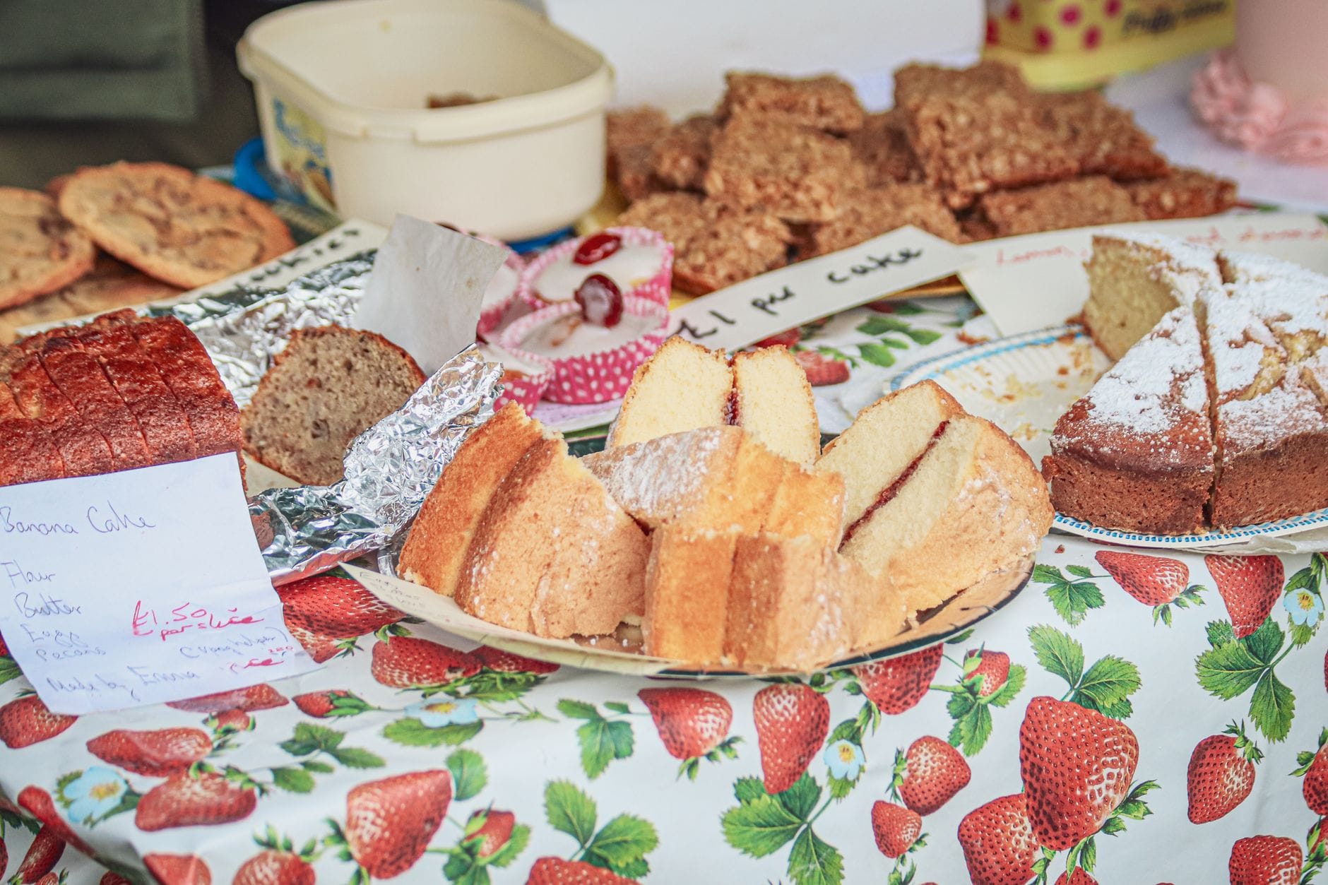 Homemade cakes and traybakes laid out on a table