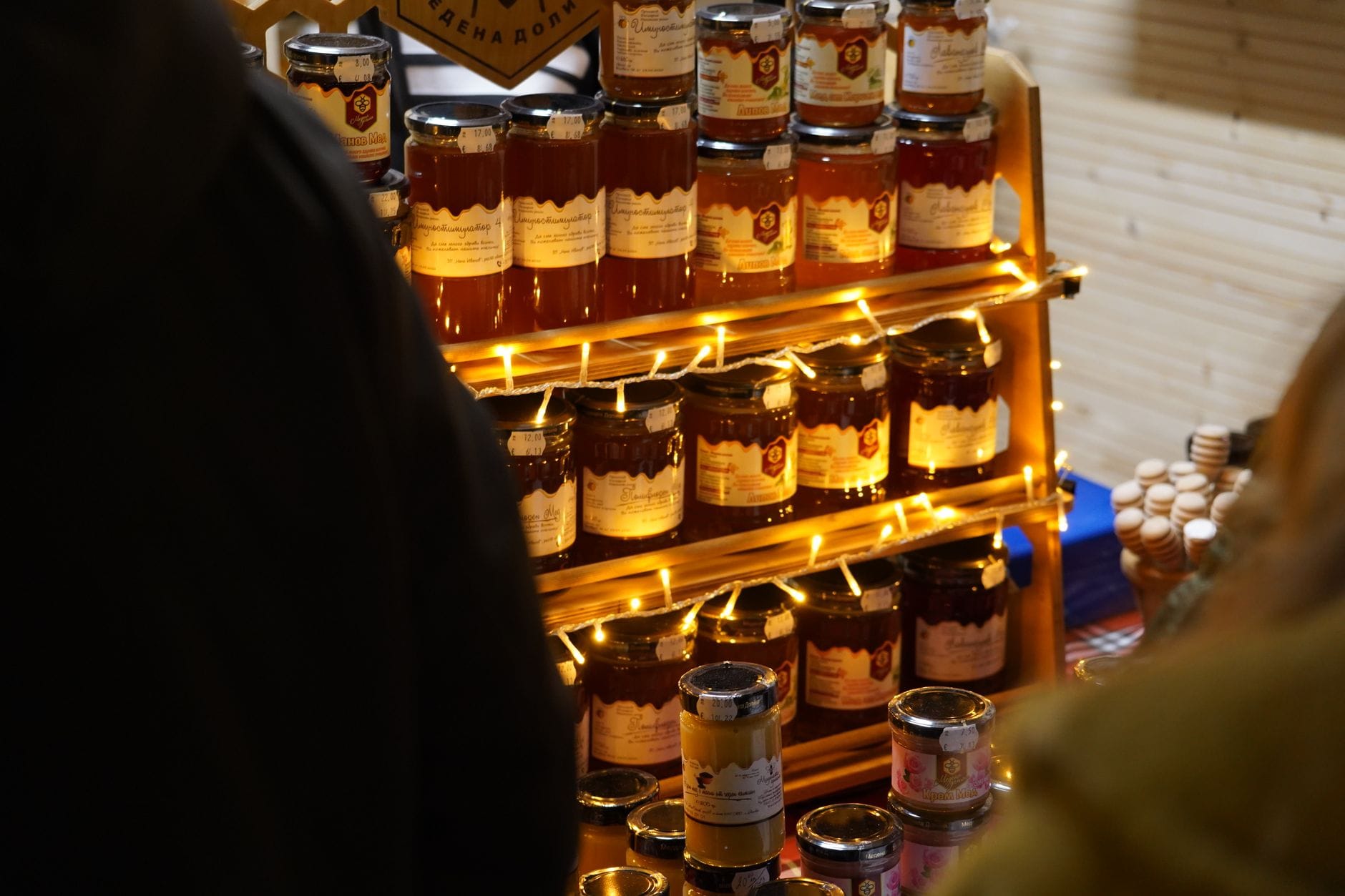 Shelves of jars of honey for sale