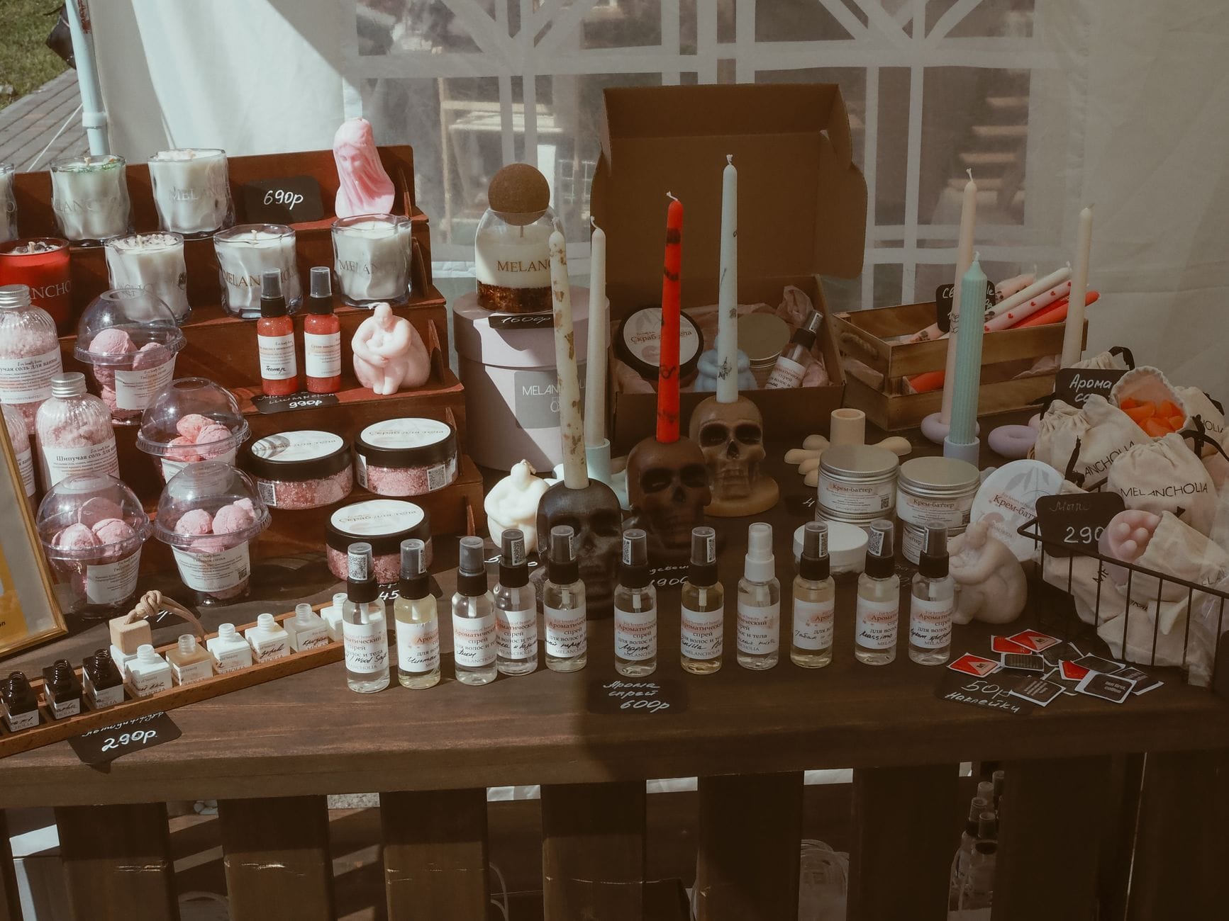 A craft stall of handmade soap and candles