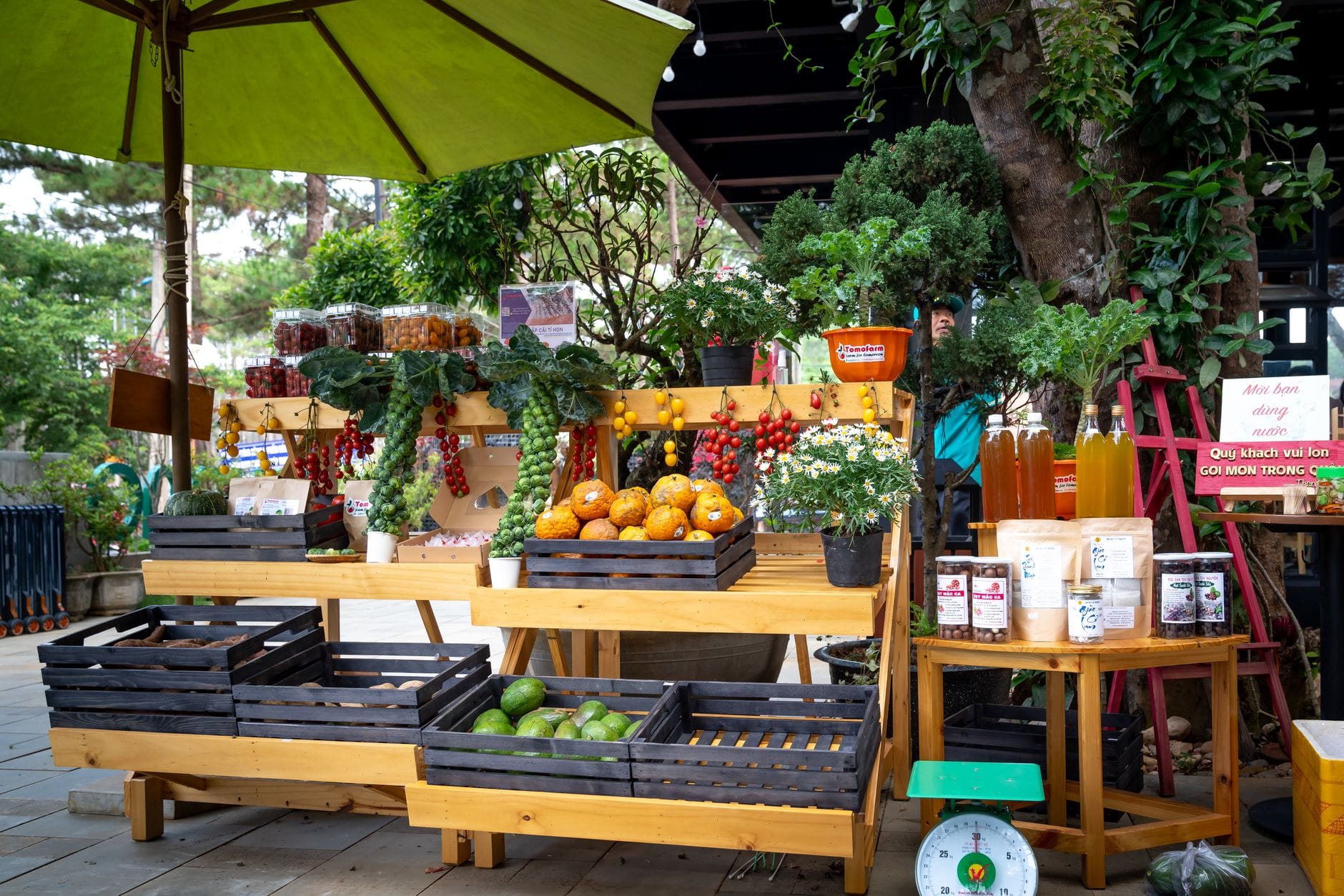 A produce market with laden stalls