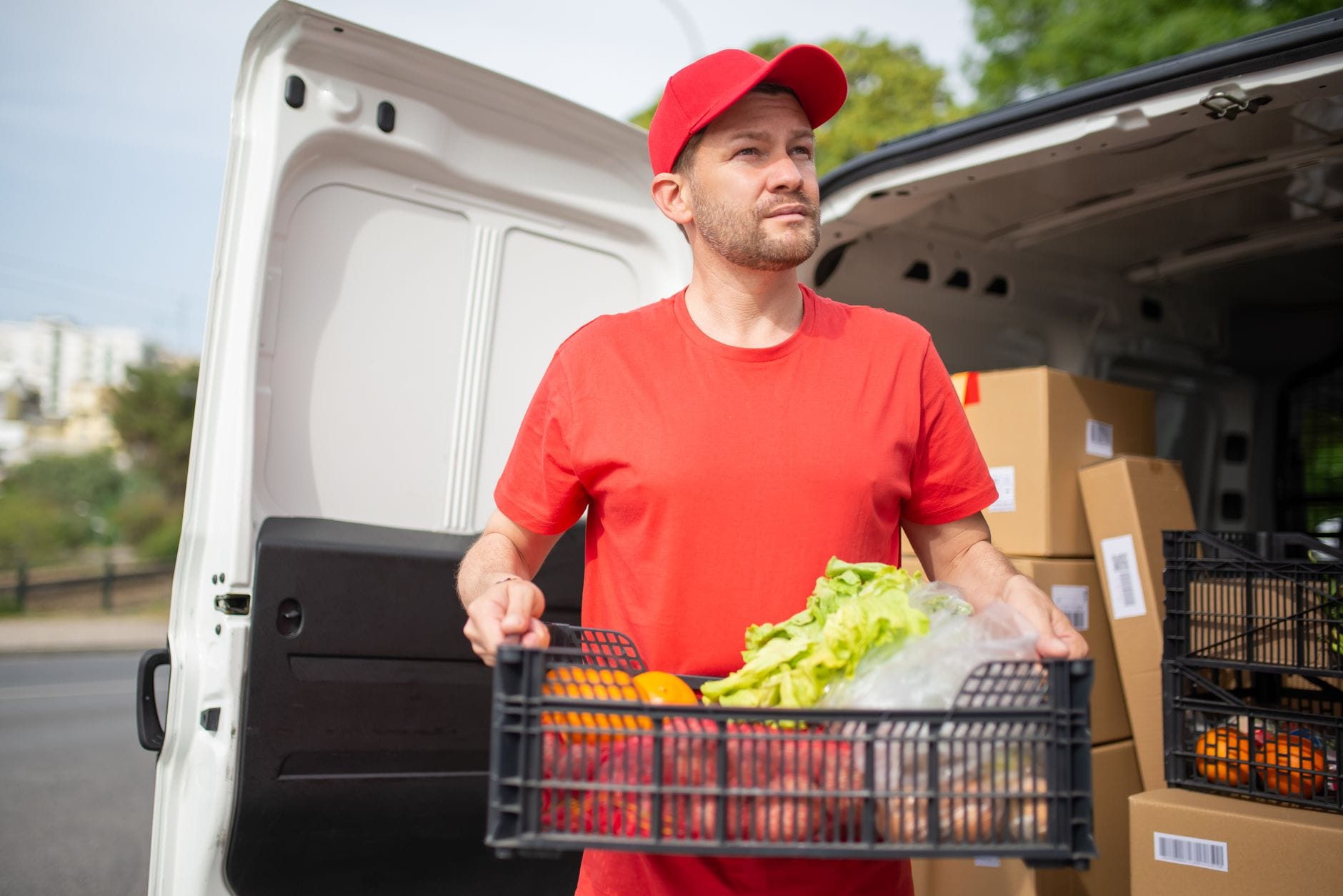 A veg box being delivered from a van